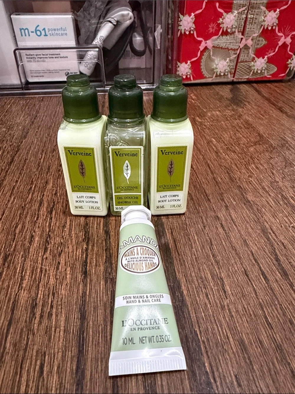 L’Occitane Travel size body lotion, shower gem, and hand cream